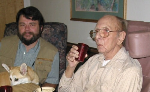 Me visiting my dad in 2003 (with Vera on my lap)